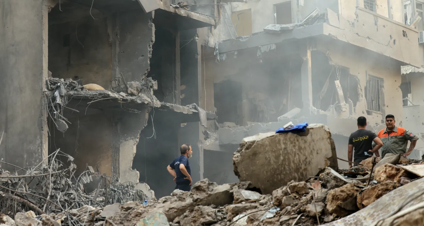 Lebanese civil defence work at the site of an Israeli air strike in the Basta area, in Beirut, on October 11, 2024, amid the ongoing war between Israel and Hezbollah. 