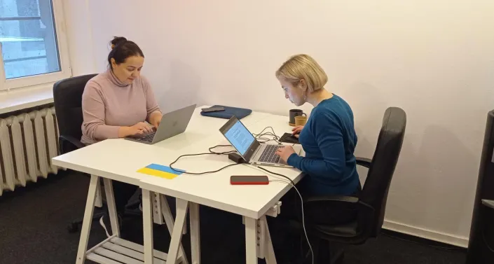 Journalists working at the media hub in Poland