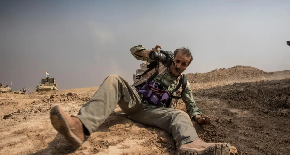 Journalist at work in conflict area 